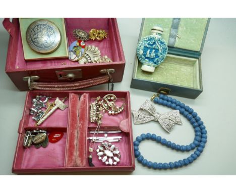 A collection of costume jewellery with two boxes, including some white metal pieces, and a Chinese snuff bottle