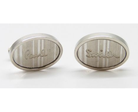 A pair of Paul Smith cufflinks, boxed