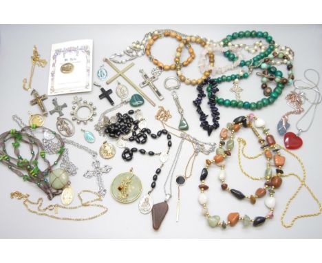 A collection of religious items including a Roma reliquary crucifix and other jewwellery together with a collection of semi p