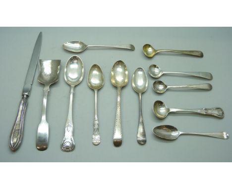 Nine silver spoons including Georgian examples, 94g, a plated caddy spoon, a plated teaspoon, and a silver handled letter ope