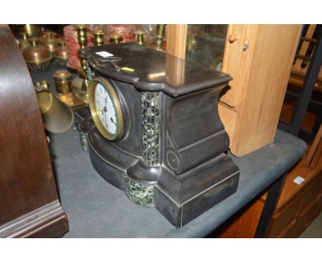A late Victorian black slate and marble two hole mantel clock 