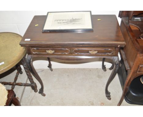 An Edwardian mahogany fold over card table fitted two drawers 