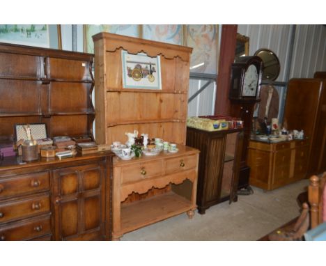 A stripped pine dresser fitted two drawers and shelf below