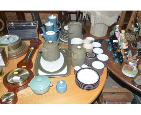 A quantity of Denby coffeeware and plates, and Poole pottery coffee pots