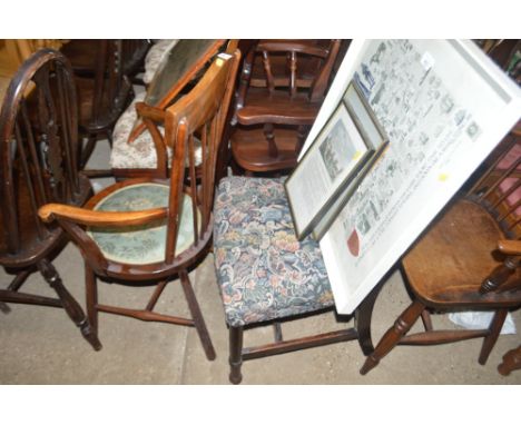 An oak spindle back dining chair and a mahogany stick back elbow chair