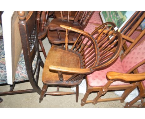 An elm seated stick back Windsor chair