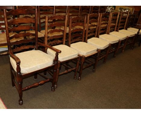 A set of five ash and elm ladder back chairs, together with three other similar chairs 