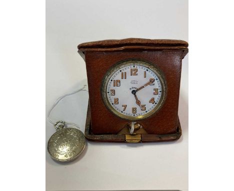 Asprey - a folding travelling bedside clock in a brown leather case together with a pocket watch in the style of an American 