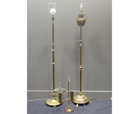 Two late Victorian/Edwardian adjustable brass standard lamps, largest 169cm high, (both converted to electricity), two brass 