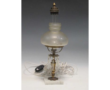 A table lamp the adjustable light with striped opaline glass shade, with globe top and hanging loop on a brass base, 67 cm an