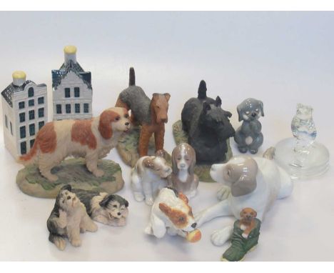 A collection of animal figurines, mainly dogs, alongside other ceramic wares, including Royal Crown Derby and Salisbury Bone 