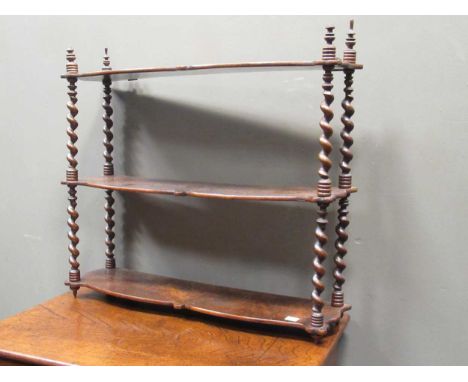 A Victorian walnut three tier wall shelf with turned barley twist supports , 57 x 63 x 15cm