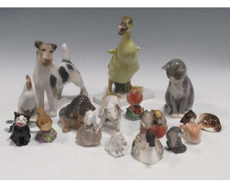 A collection of Copenhagen, Worcester, Doulton, Rosenthal and other decorative ceramic animal models 