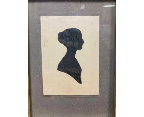 A group of four Regency period portrait miniature silhouettes 10 x 7cm, in maple frames 24 x 19.5cm
