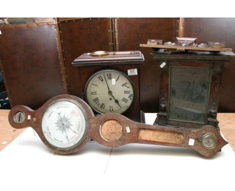 A mantle clock, barometer and clock parts