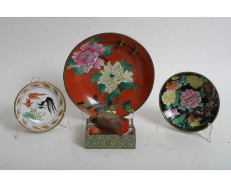 A 20th century hardstone seal and three Chinese porcelain dishes