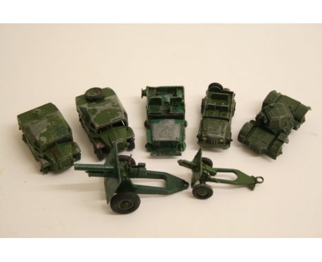 A collection of play worn Dinky diecast military vehicles comprising 2 x field artillery tractor 686, jeep, armoured car 170,
