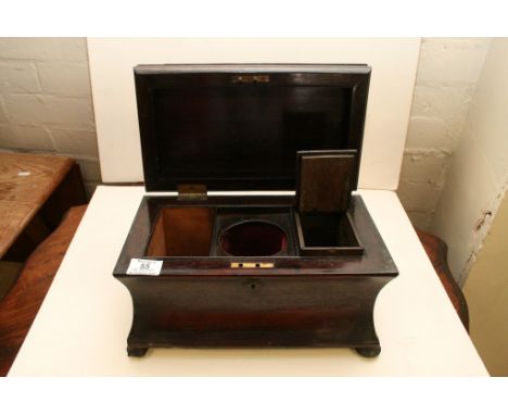 A rosewood tea caddy