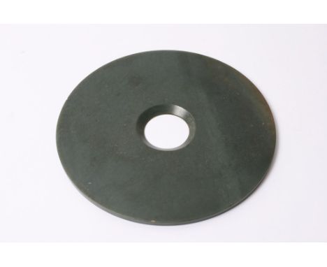 A Chinese green hardstone bi-disc possibly jade. Diameter: 19.5cm approximately