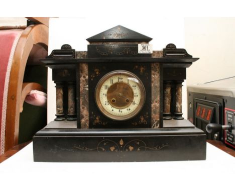 A black slate mantle clock
