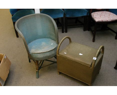 A small Lloyd Loom style chair with a Lloyd Loom style lift top stool 