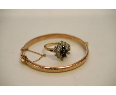 A gold stone set ring and 9ct gold child's christening bangle