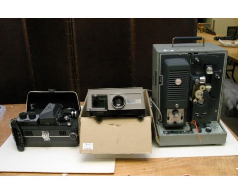 A Kodak Super 8 reel to reel film projector, a Hanimex film editor and a slide projector