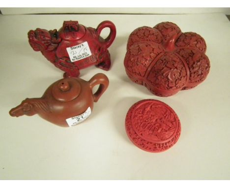 A small Chinese pottery teapot with horse shaped spout, character seal to base and a collection of cinnabar type items