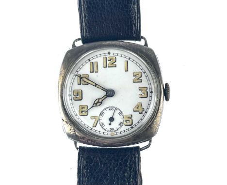An early 20th century silver cased trench wristwatch. By The Services Watch Co Ltd. The 26mm white enamel dial with luminous 