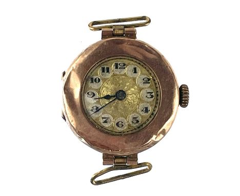 A 1920's 9ct rose gold cased ladies manual wind wristwatch. Gross weight 12.79g.