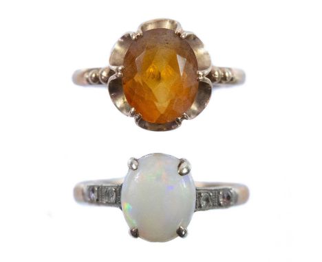 One set with white opal, the other citrine, both size O, 4.68g.