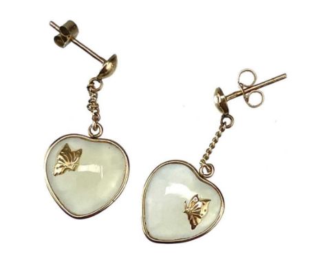A pair of gold mounted heart shaped celadon jade drop stud earrings. Each applied with a butterfly, length of drop 27mm, 2.24