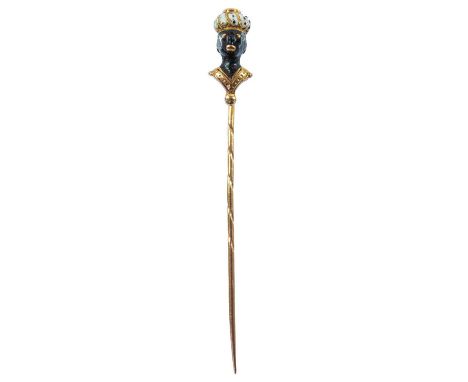 The head in the form of a blackamoor, stamped marks to the pin, length 63mm, 2g, within a stick pin box.