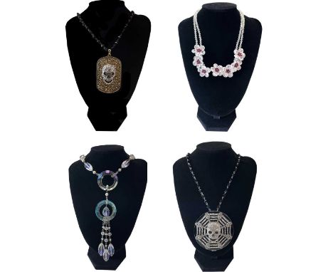 A Butler &amp; Wilson skull and web mirror compact pendant necklace. Together with three other Butler &amp; Wilson necklaces,