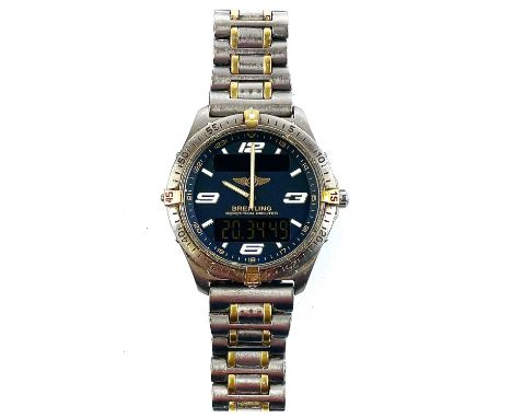 A Breitling Aerospace titanium and gold plated gentleman's bracelet wristwatch. Ref F65362, the signed dial with luminous bat