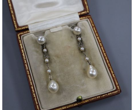 A pair of early 20th century white metal and cultured pearl? drop earrings, 44mm.
