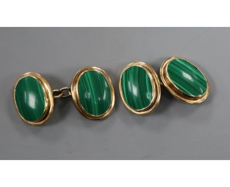 A pair of 9ct gold mounted malachite oval cufflinks.
