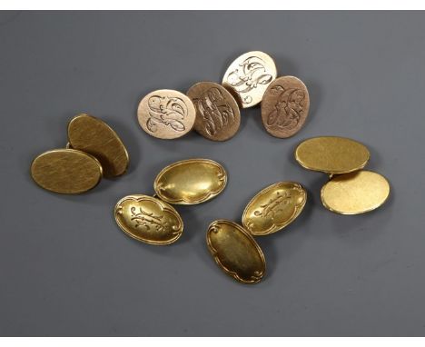 Two pairs of 18ct gold oval cufflinks and one pair of 9ct gold oval cufflinks.