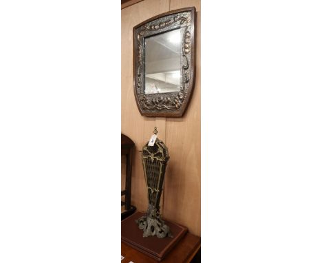 A Louis XVI style ormolu fan firescreen and an Arts &amp; Crafts oak wall mirror with planished, embossed copper mount Mirror