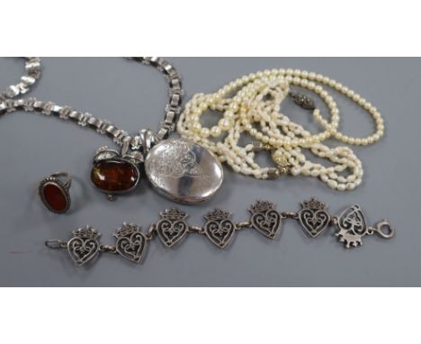 A white metal locket on chain, an Iona white metal bracelet, a brooch, a ring and two pearl necklaces, cultured and freshwate