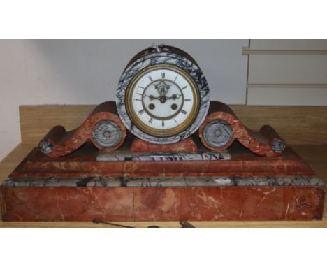 A Victorian rouge and grey marble mantel clock height 33cm, with key and pendulum