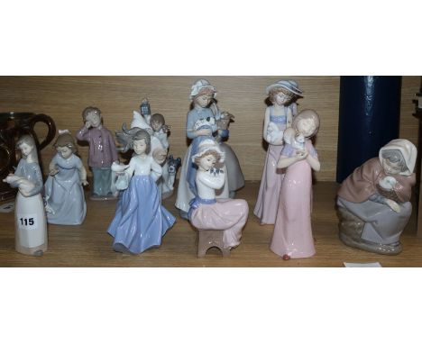 Thirteen Nao figures of children holding animals