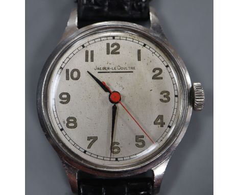A gentleman's stainless steel Jaeger LeCoultre manual wind wrist watch, on later associated strap.