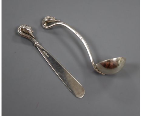 A modern silver ladle and latter opener by Sara Jones, London, 1994 &amp; 1996, both with swan head terminals, largest 12cm.