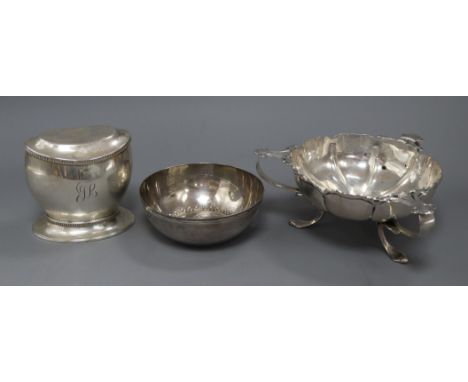 An Art Nouveau style silver three-handled bowl, Birmingham 1915, Elkington &amp; Co, a silver tea caddy and a 925 standard bo