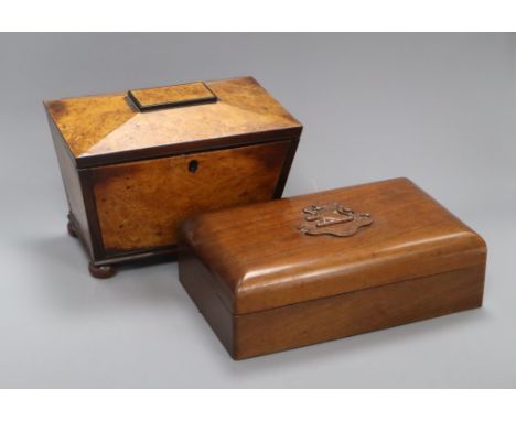 A Georgian burr maple tea caddy and a carved crested box