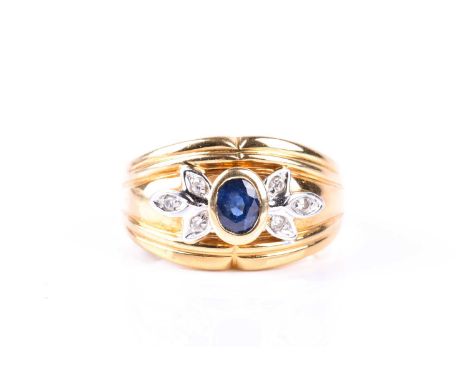 A sapphire and diamond ring, the oval cut sapphire in rub over mount with three stone diamond foliate shoulders, reeded taper