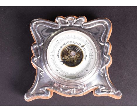 An Edwardian silver mounted desk barometer, Birmingham 1905 by William Vale &amp; Sons, of art nouveau design, 12 cm x 13.5 c