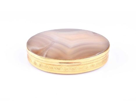 A 19th century oval agate snuff box with gilt metal mounts, banded agate top and base, engraved gilt metal sides, hinged cove