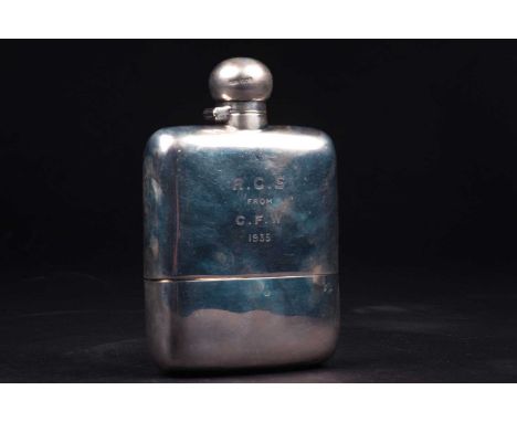 A late Victorian silver hip flask, Sheffield 1894 by James Dixon &amp; Sons, of plain form with hinged cover and presentation